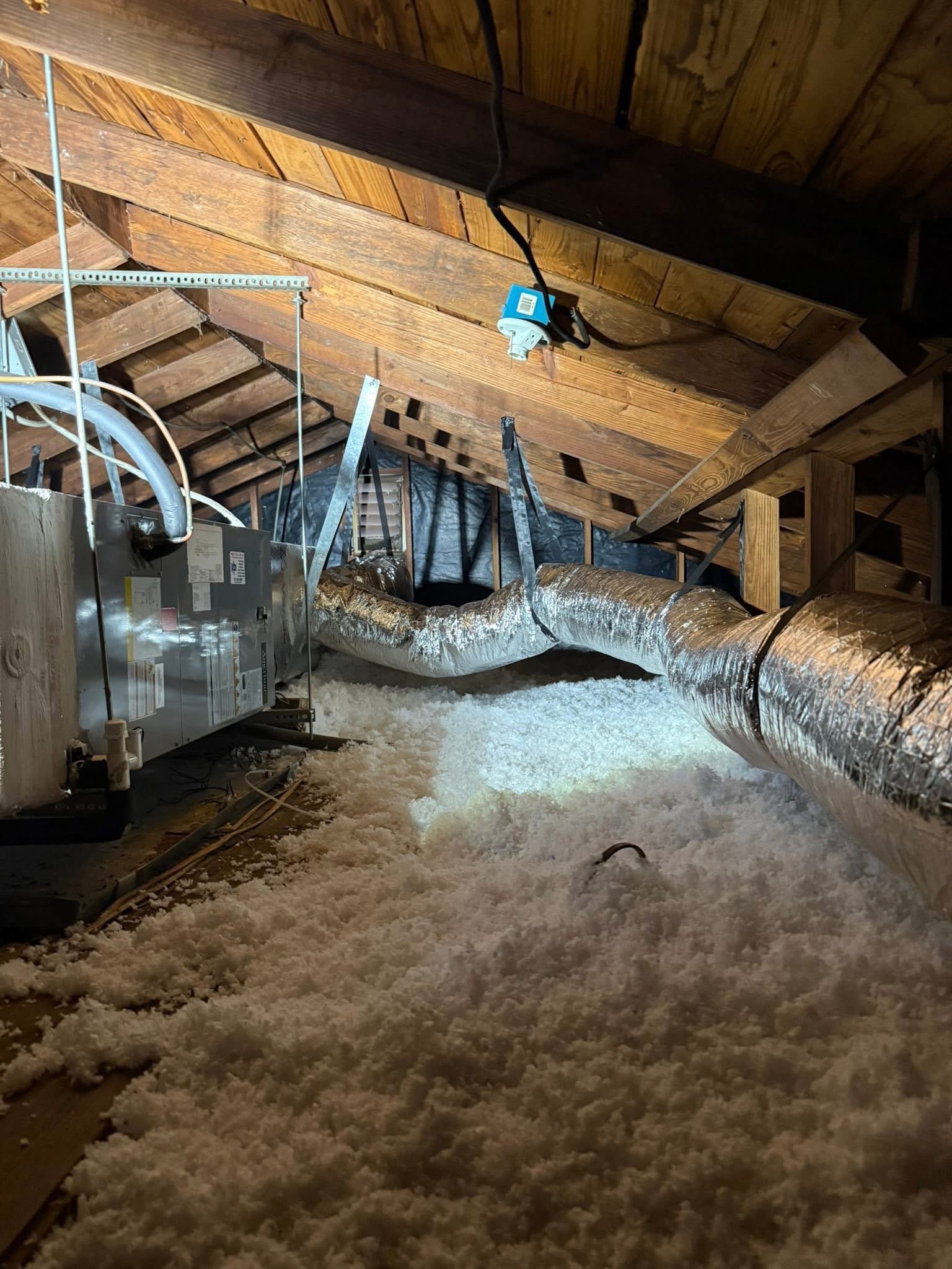 Attic ductwork and insulation review during an efficiency consultation
